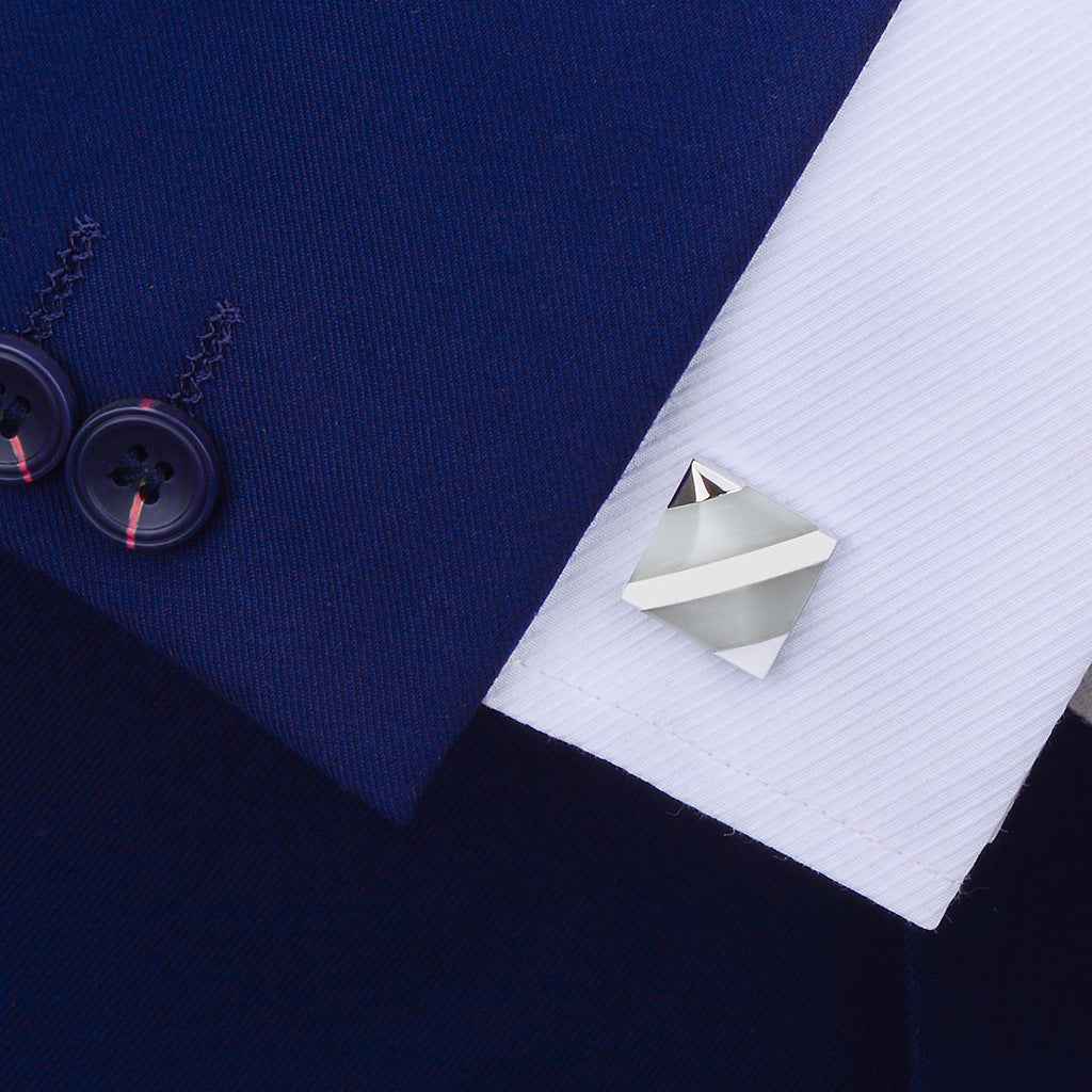 White diagonal stripe double-row cufflinks fastened on shirt cuff