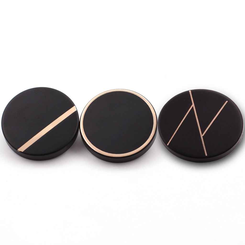 Black metal shank coat button, round face with gold-colored stripes
