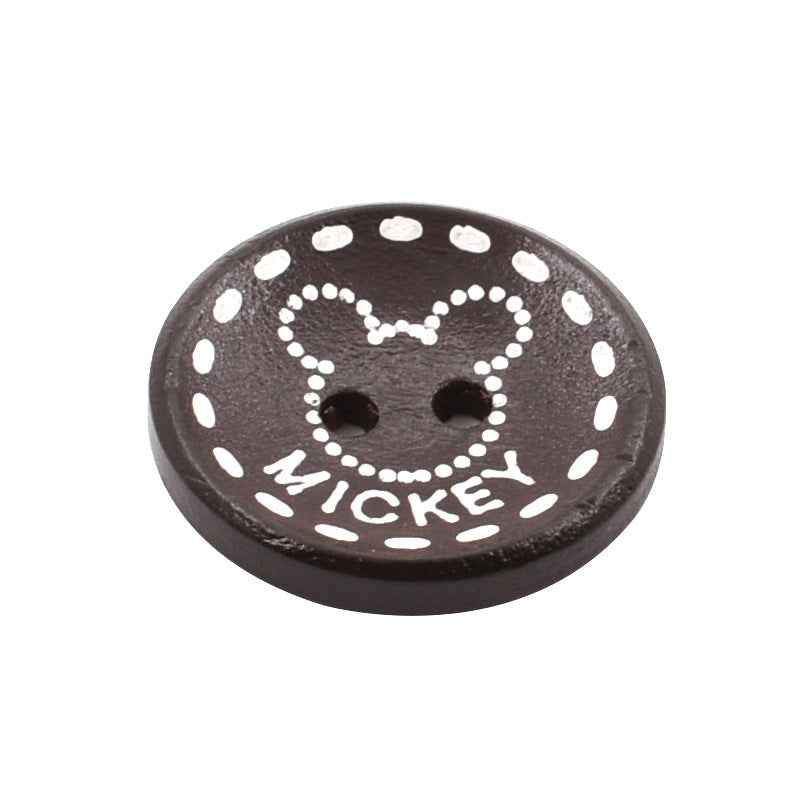 Single dark brown two-hole wood button with white polka dots and Mickey-style face