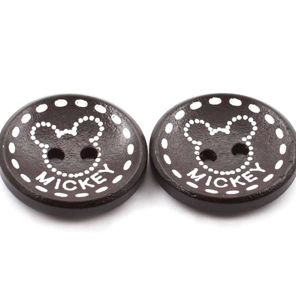 Two dark brown wood buttons with two holes; white Mickey-style face print and dotted border