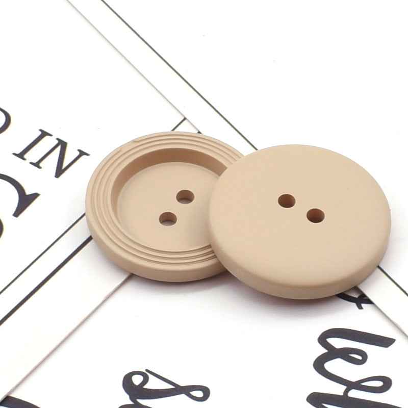 Round 2-hole resin buttons in tan/beige, 25mm for crafts and garment fastening
