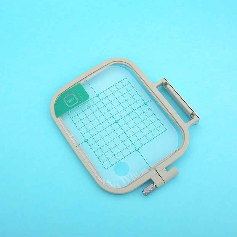 Large rectangular embroidery hoop frame with grid lines and adjustable mounting screw