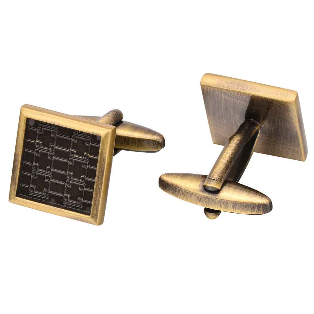 Antique bronze square cufflinks with engraved geometric pattern on dark panels
