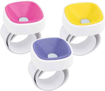 3-pack magnetic wrist pin cushions: pink, yellow, blue pads on white wrist bands.