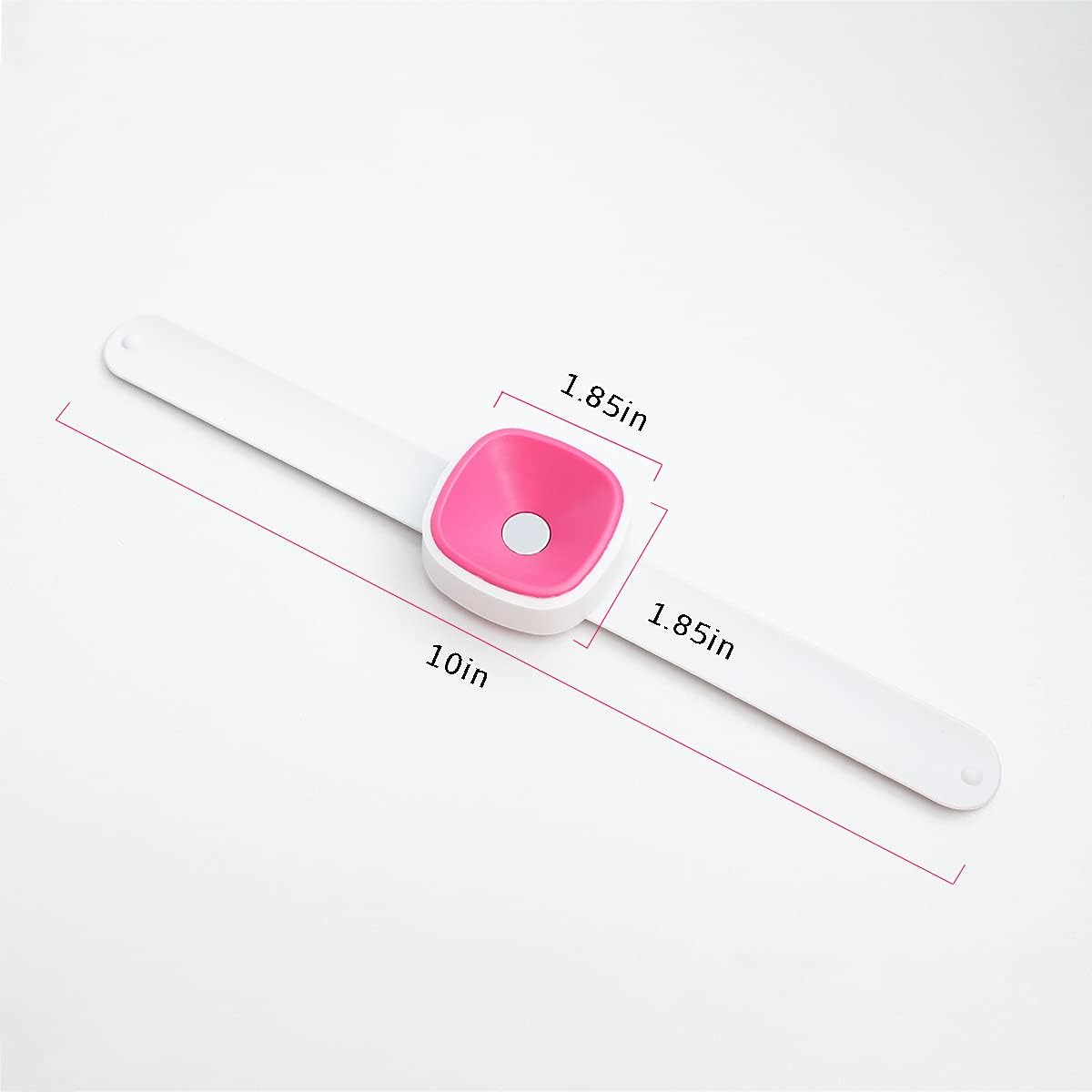 Pink magnetic wrist pin cushion band laid flat with size markings in inches.