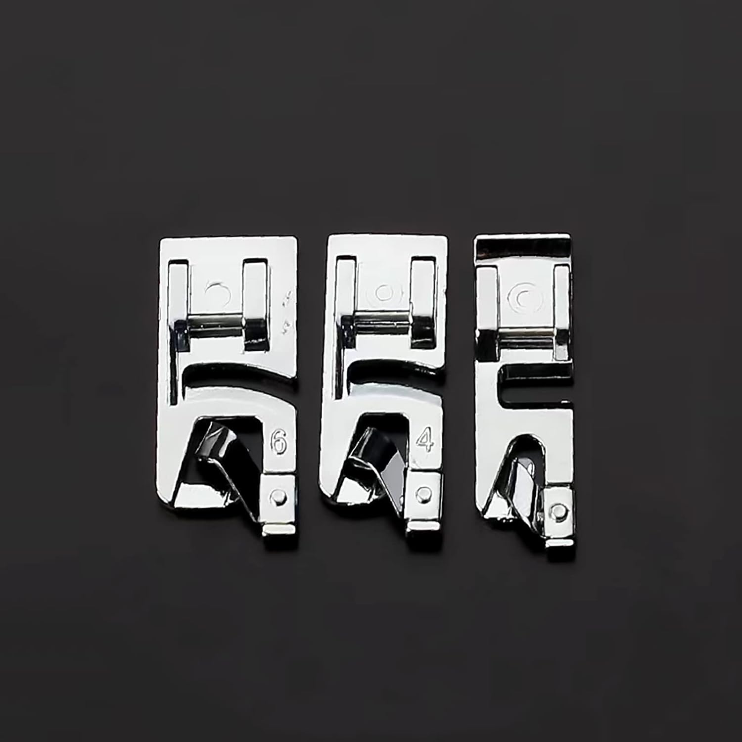 Rolled hem presser feet close-up, marked 3, 4, and 6mm for narrow hems