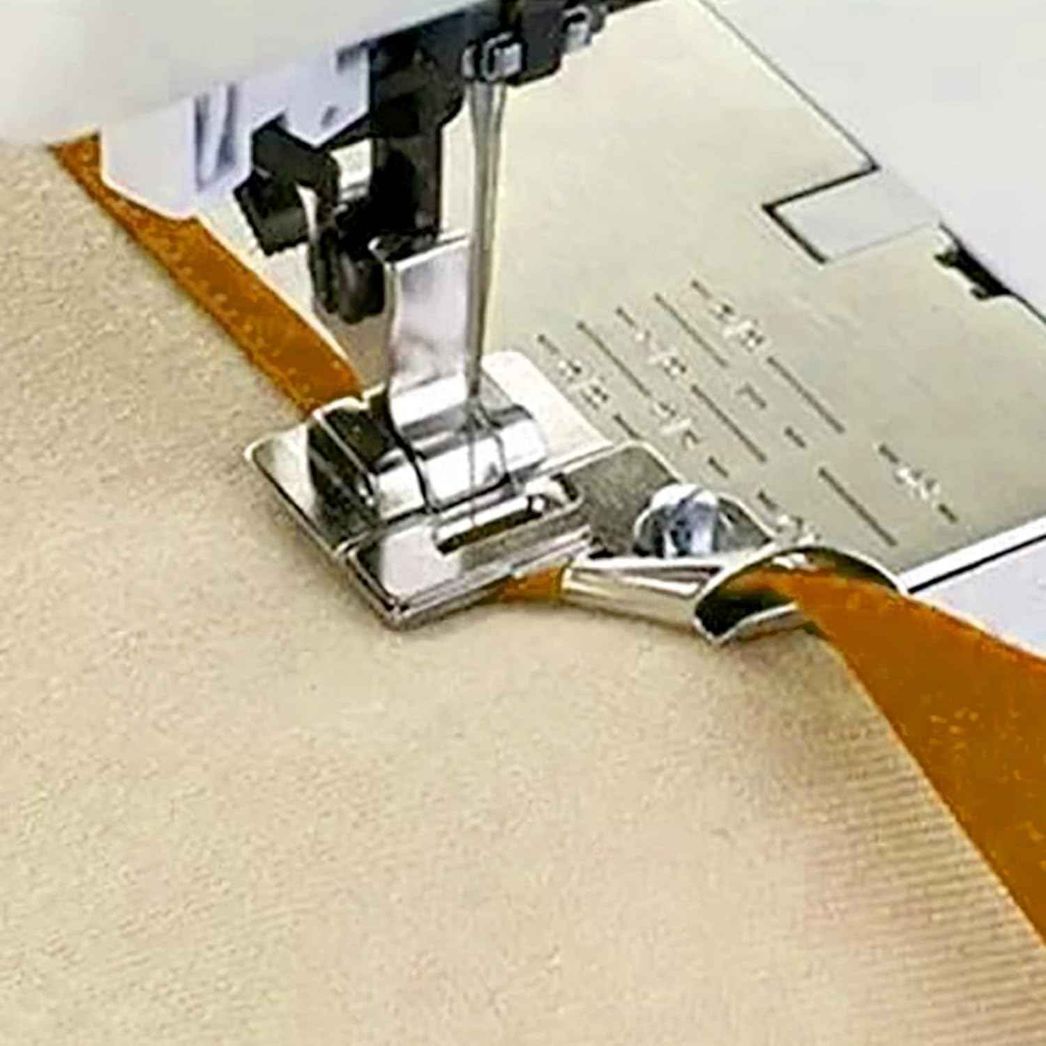 Snap-on binder presser foot on sewing machine, guiding fabric edge