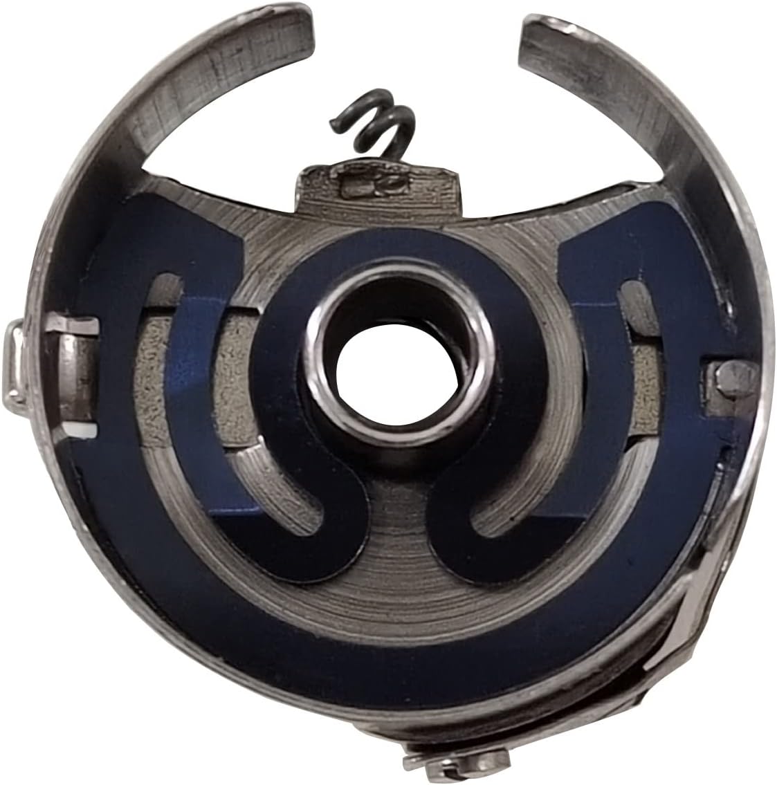 Bobbin case base view with blue brake pads and central hole, gray metal frame