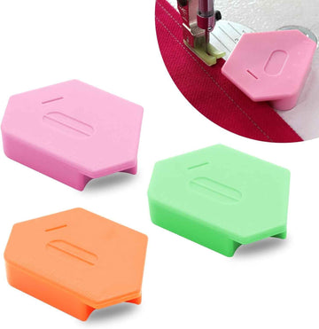 Magnetic seam guides set—pink, green, orange pieces with guide slots