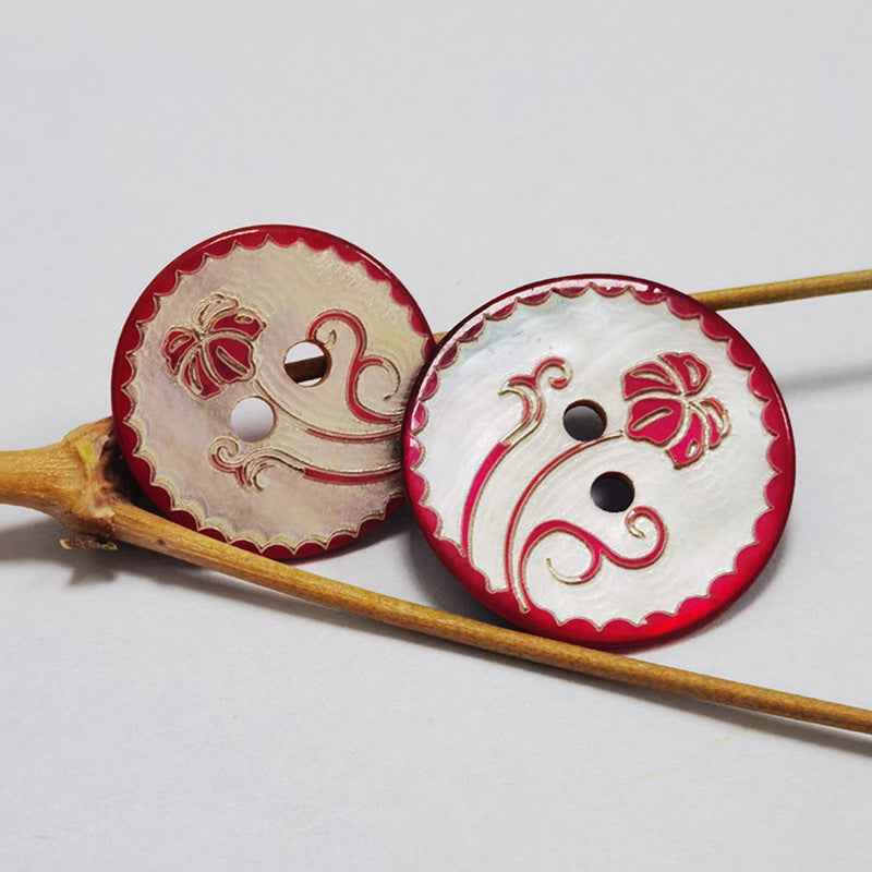 Round mother-of-pearl 2-hole shell buttons with red/black floral designs