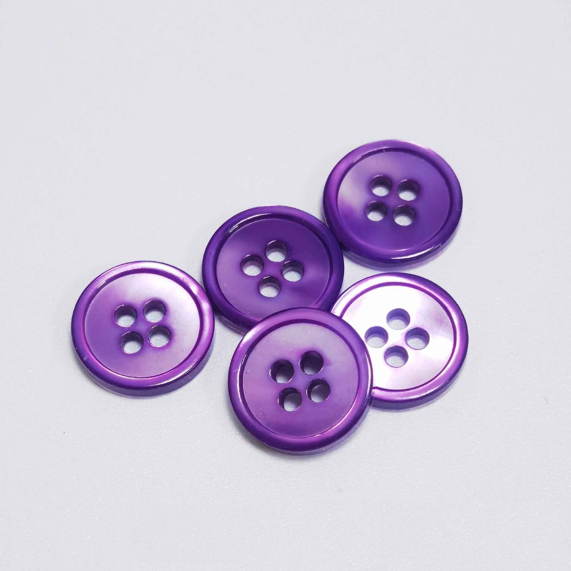Purple round 4-hole shell-look buttons with glossy iridescent sheen