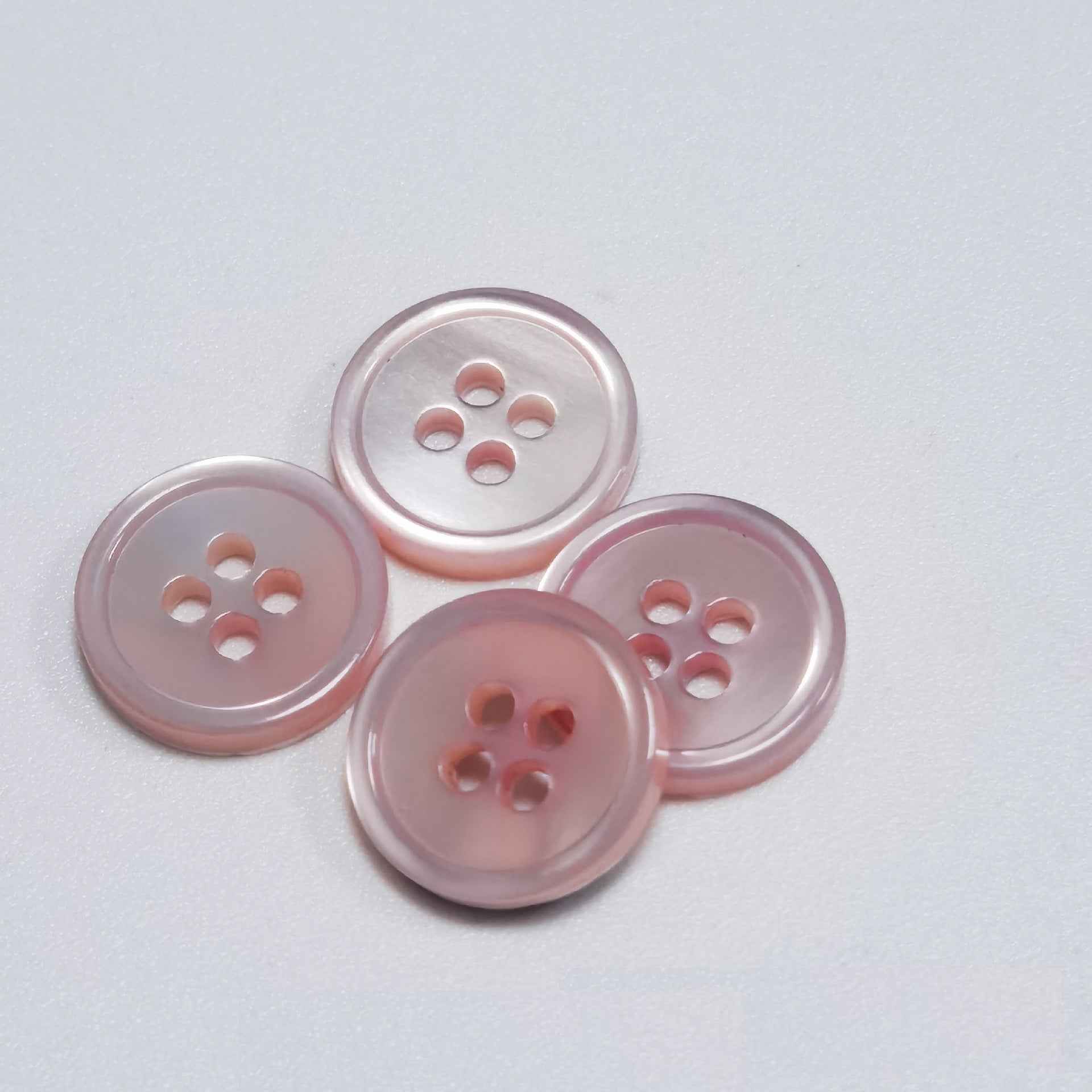 Pink round 4-hole shell-look buttons with metallic rim