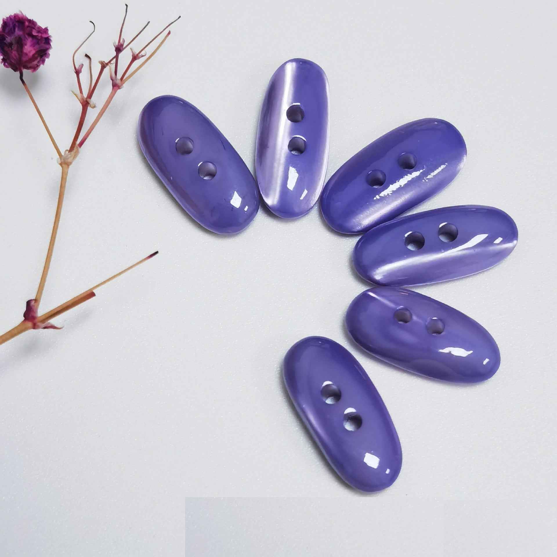 Ovale Perlmutt-Knöpfe mit 2 Löchern, blau-violett, glänzend