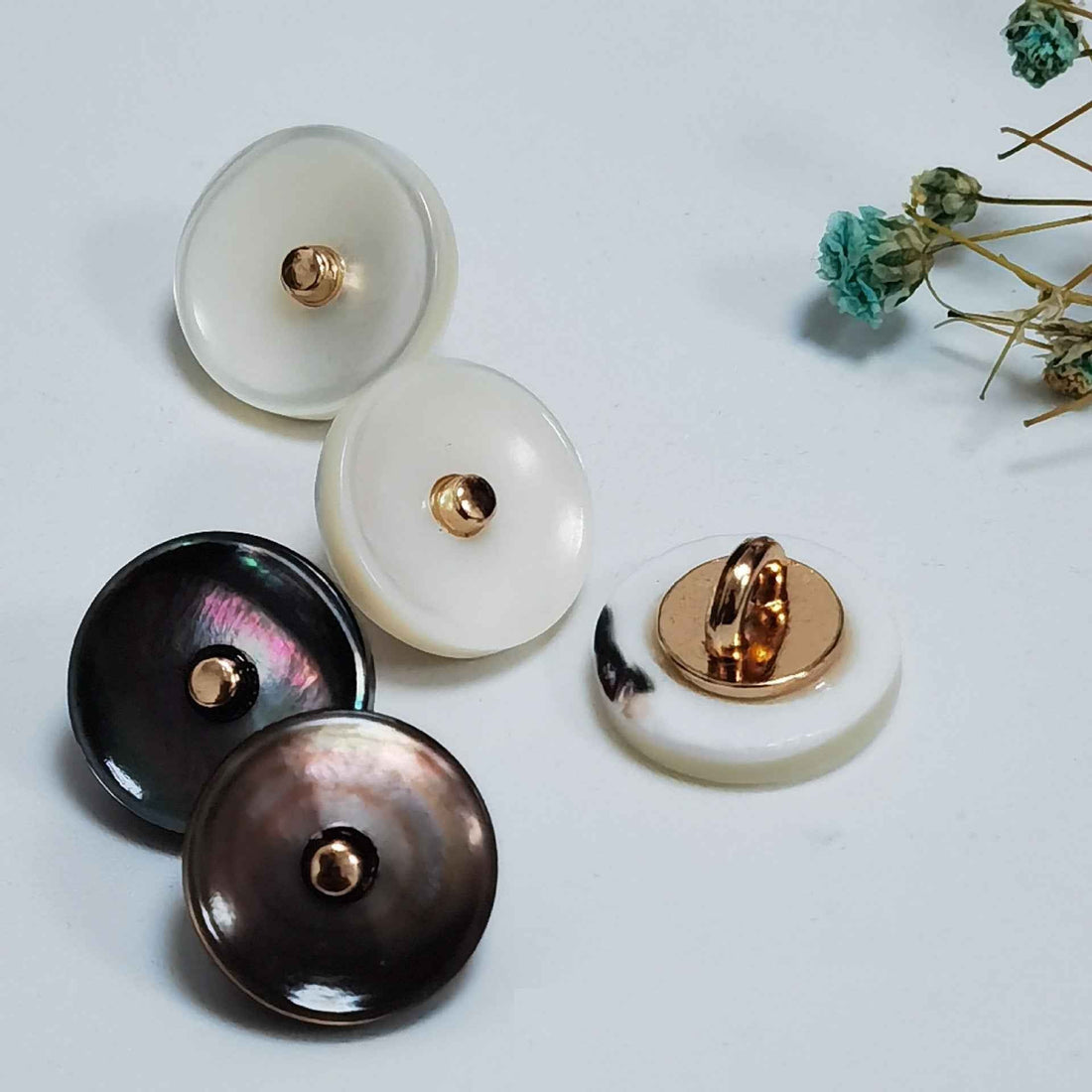 Ivory & black mother-of-pearl shank buttons, gold-tone backs, 5 buttons shown