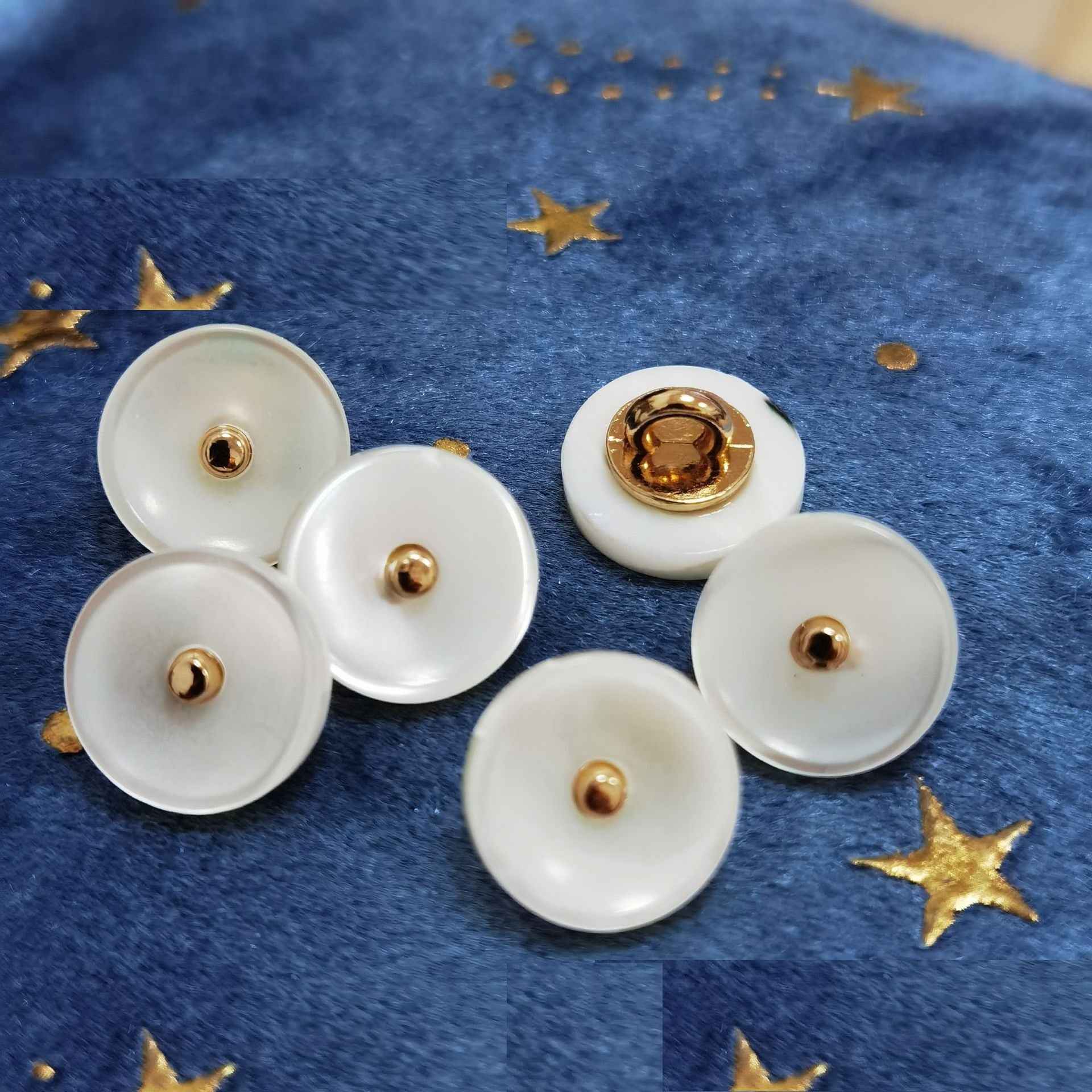 Ivory mother-of-pearl shank buttons with gold-tone metal backing, 5 buttons shown