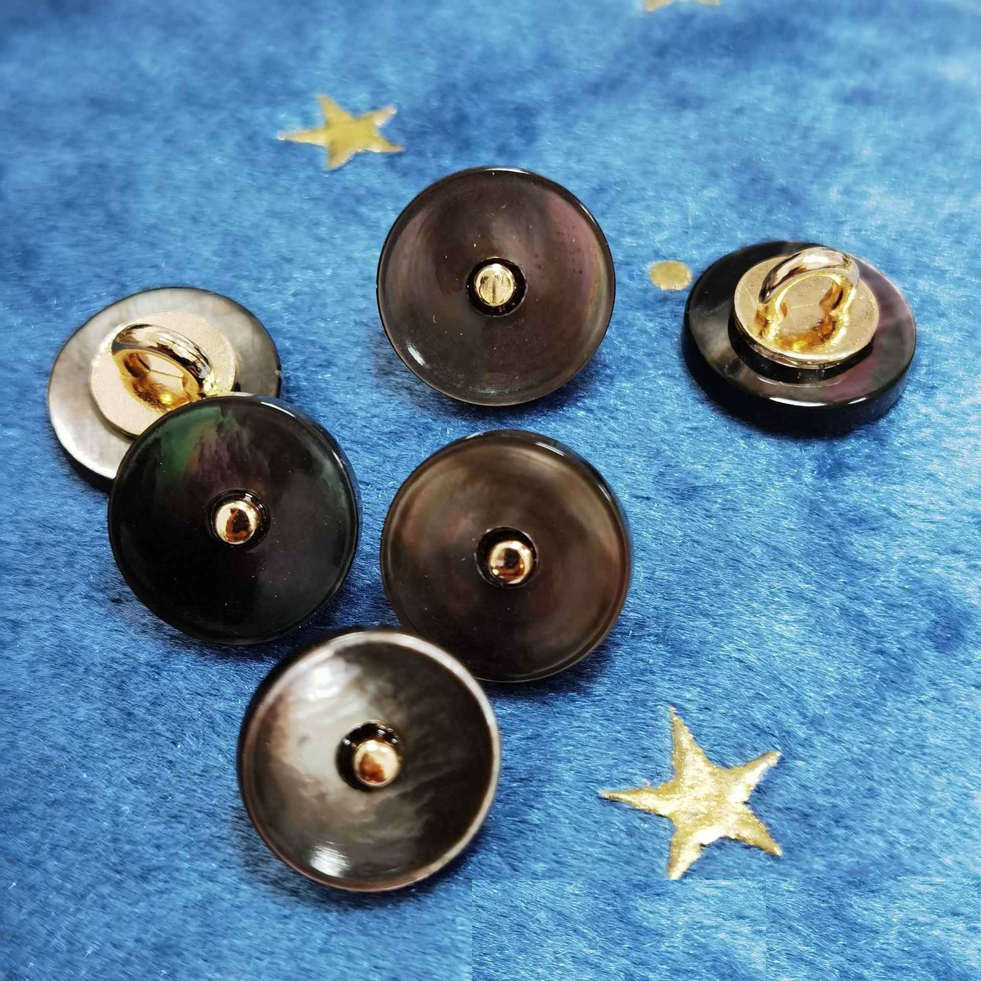 Black mother-of-pearl shank buttons with gold-tone metal backing, 5 buttons shown
