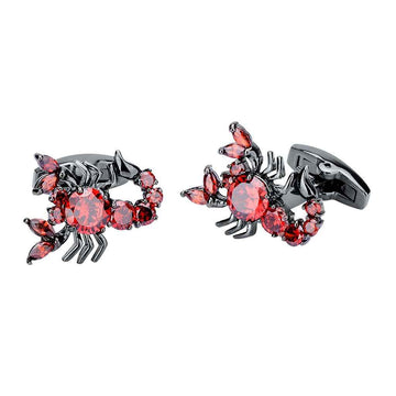 Scorpion cufflinks with red zircon stones on gunmetal claws