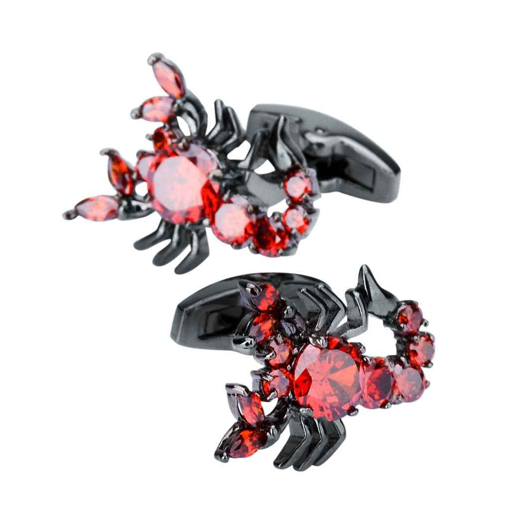 Scorpion cufflinks with red zircon stones on gunmetal claws