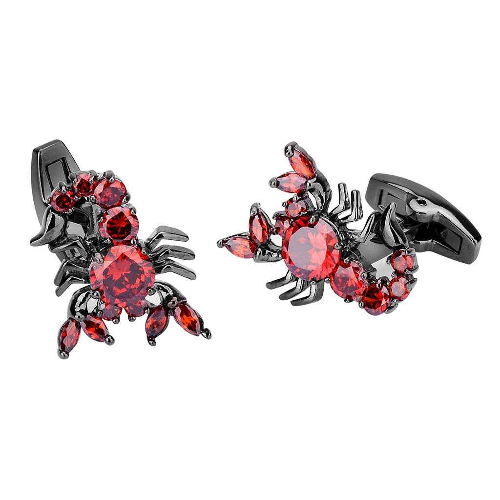 Pair of scorpion cufflinks with red oval and marquise stones, dark metal setting