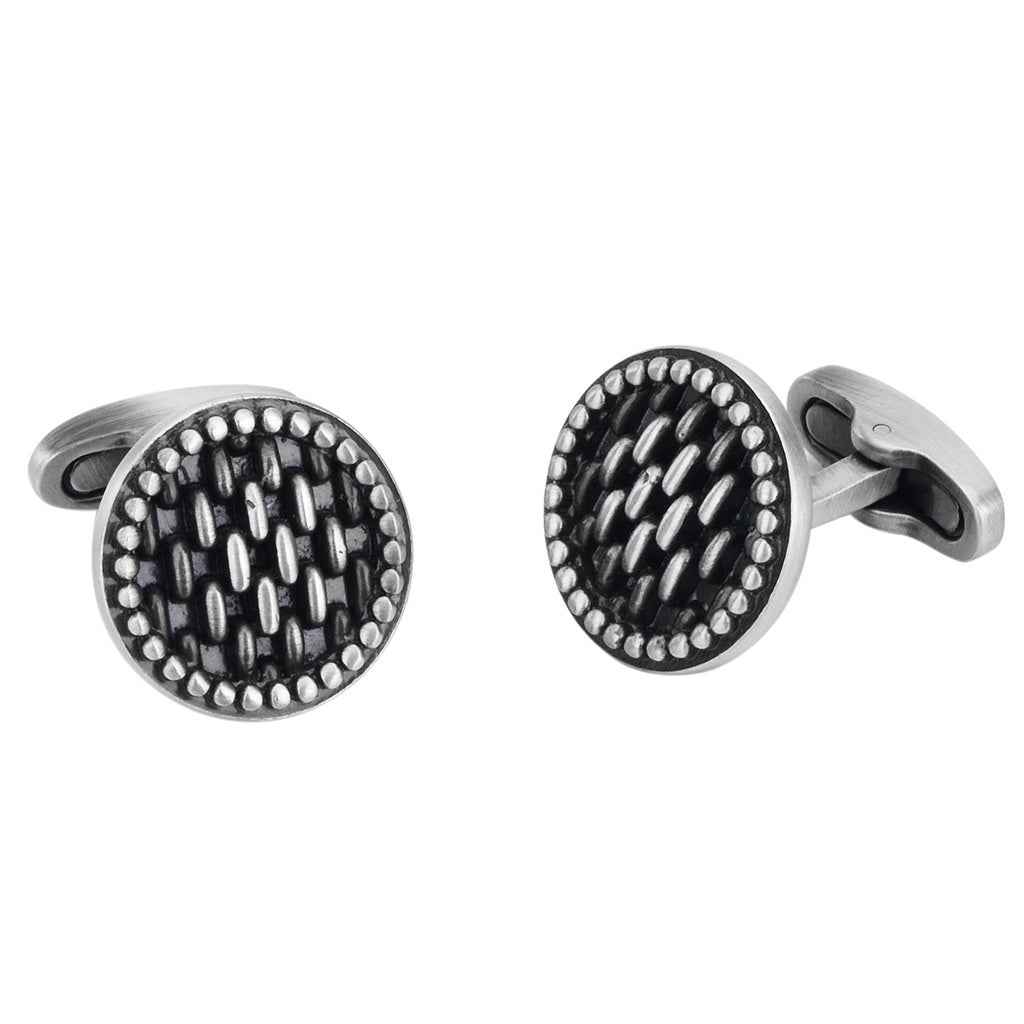 Pair of round vintage cufflinks with black inlay and silver bead rim