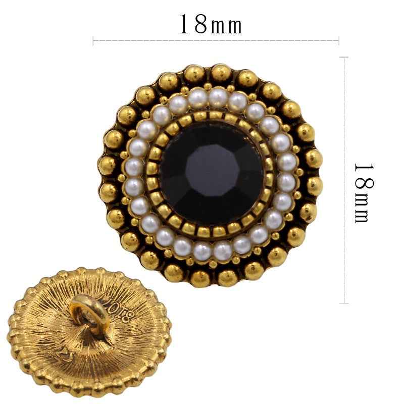 18mm pearl-and-gold shank button with oval black crystal center and bead rim