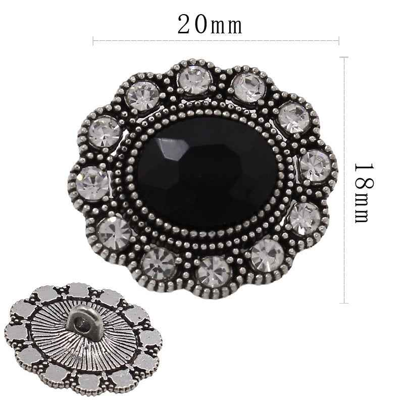 20mm dark shank oval button with black center crystal and silver rhinestone border