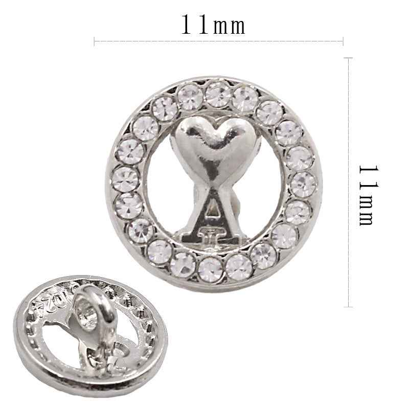 Silver round rhinestone shirt button, 11mm, with heart-shaped shank center and crystal ring