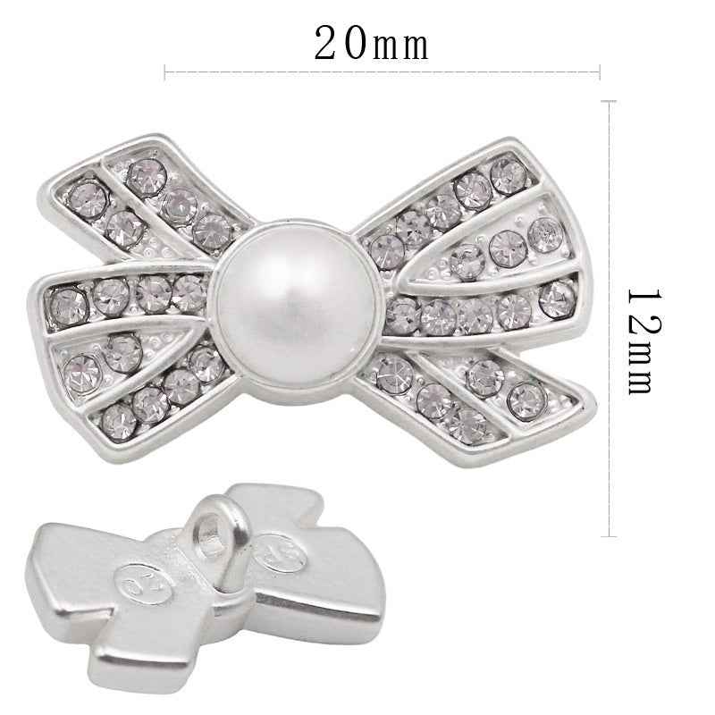 20x12mm bow-shaped rhinestone button, white pearl center, silver-tone setting