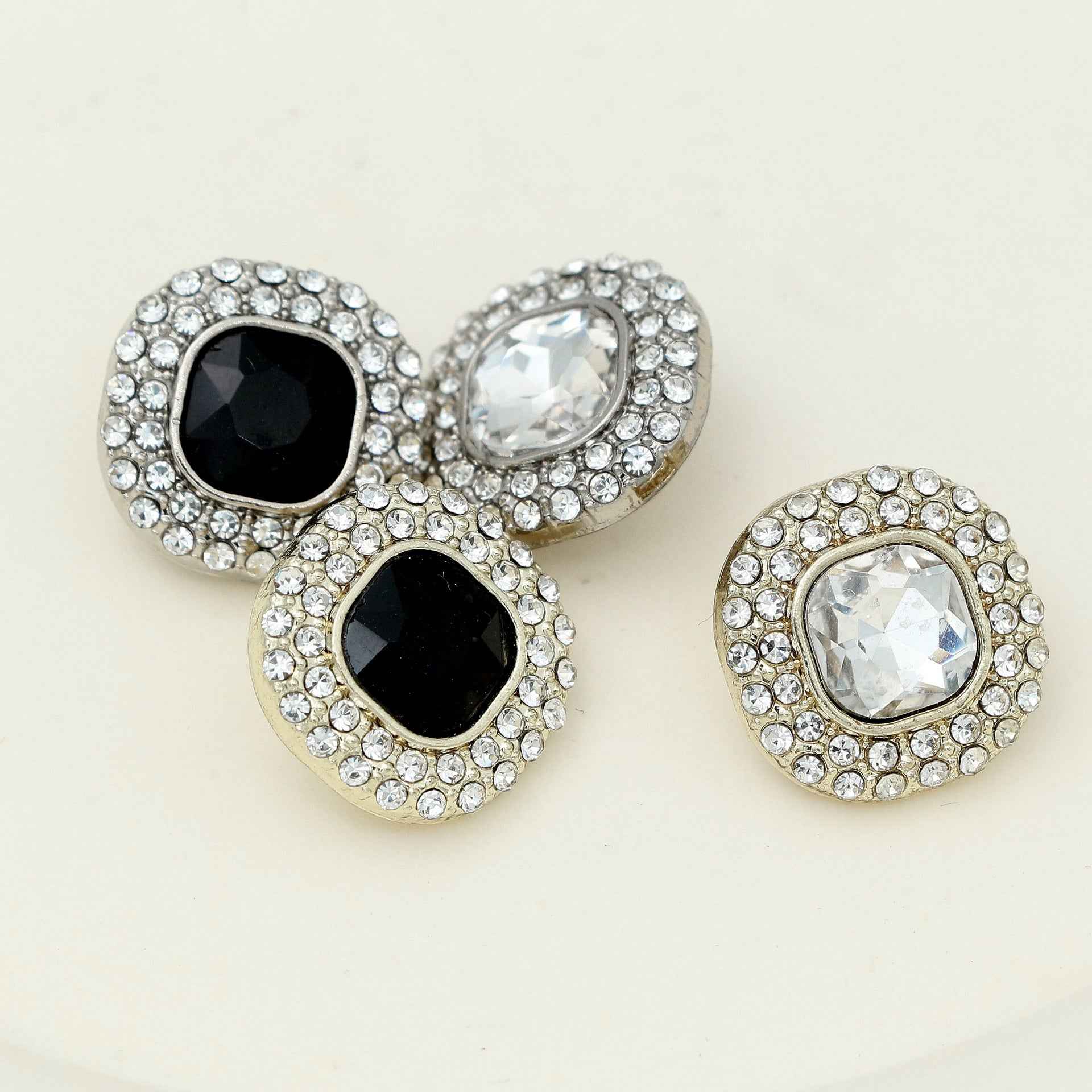 Rhinestone shank buttons (set), silver-toned with clear and black square crystals.