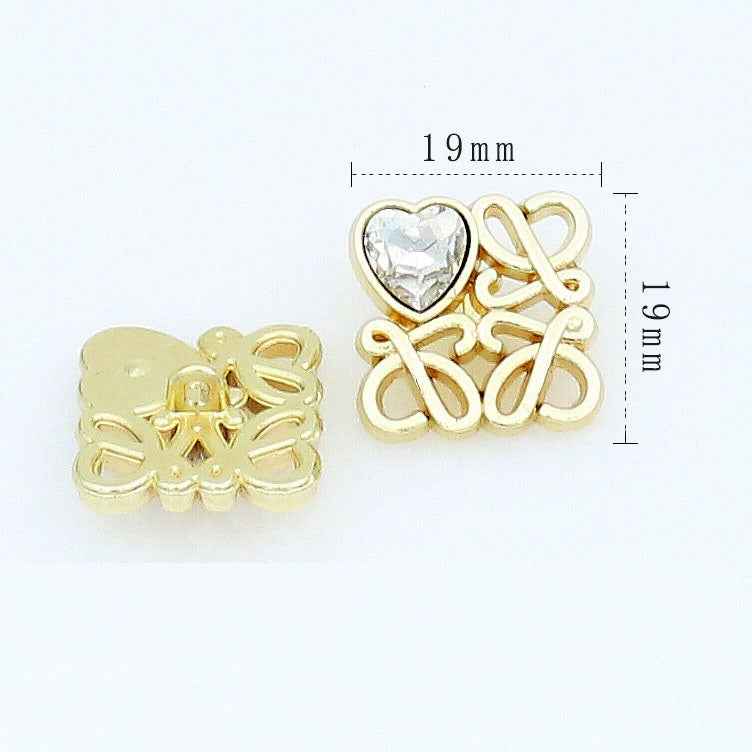 Gold square filigree button with clear heart glass, 19 mm size