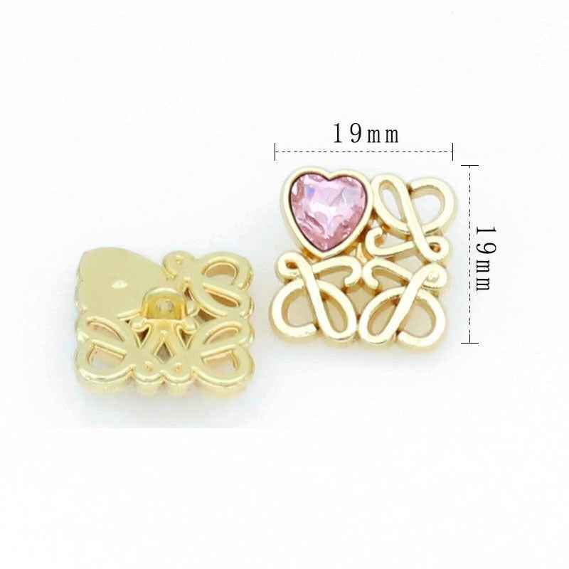 Gold square filigree button with pink heart glass, 19 mm size