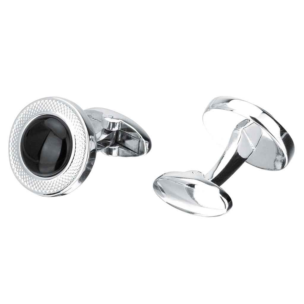 Silver-tone round cufflinks with black onyx centers and hinged clasp hardware