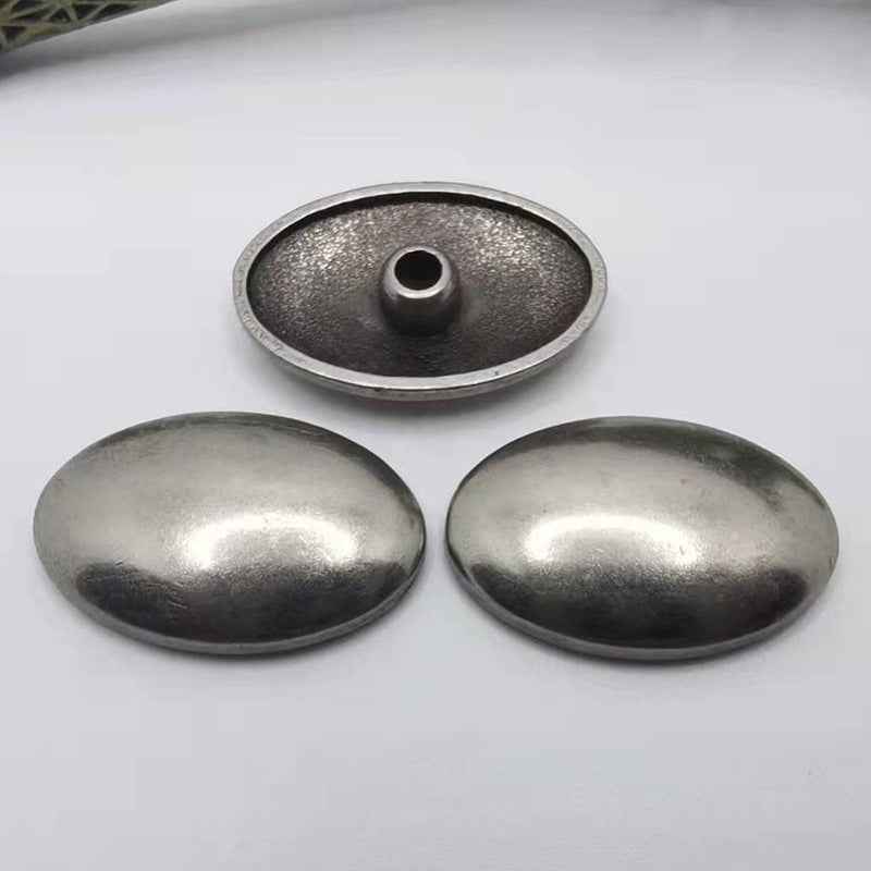 Antique silver oval rivet studs with central hole; 3 pieces visible