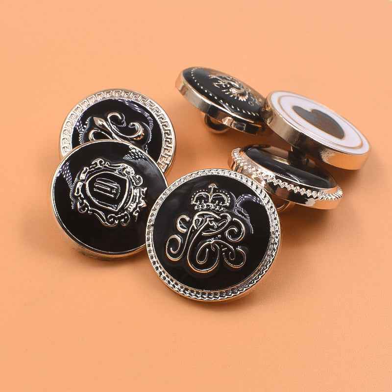 Black 21/23mm plastic shank buttons with silver rim and decorative front designs, 60 pack