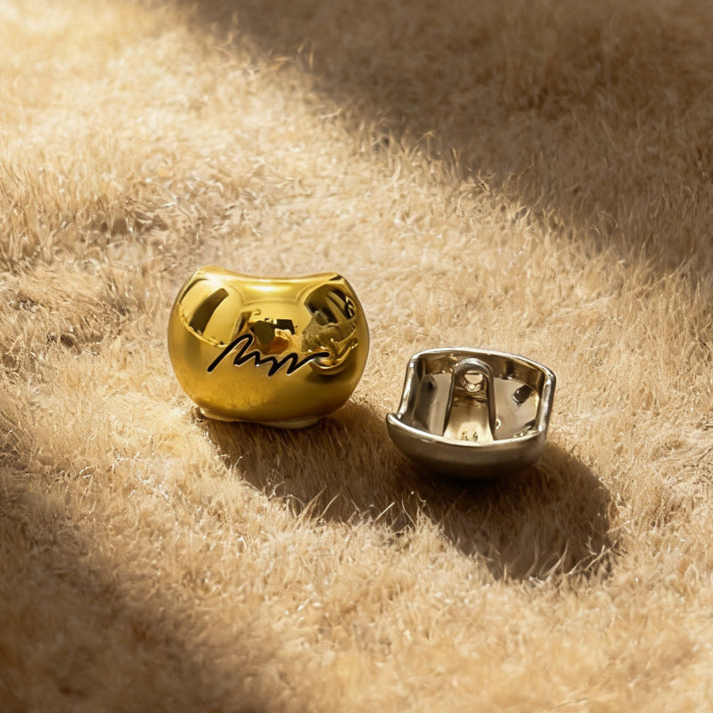 Gold arched monogram metal button with engraved letter and metal loop back