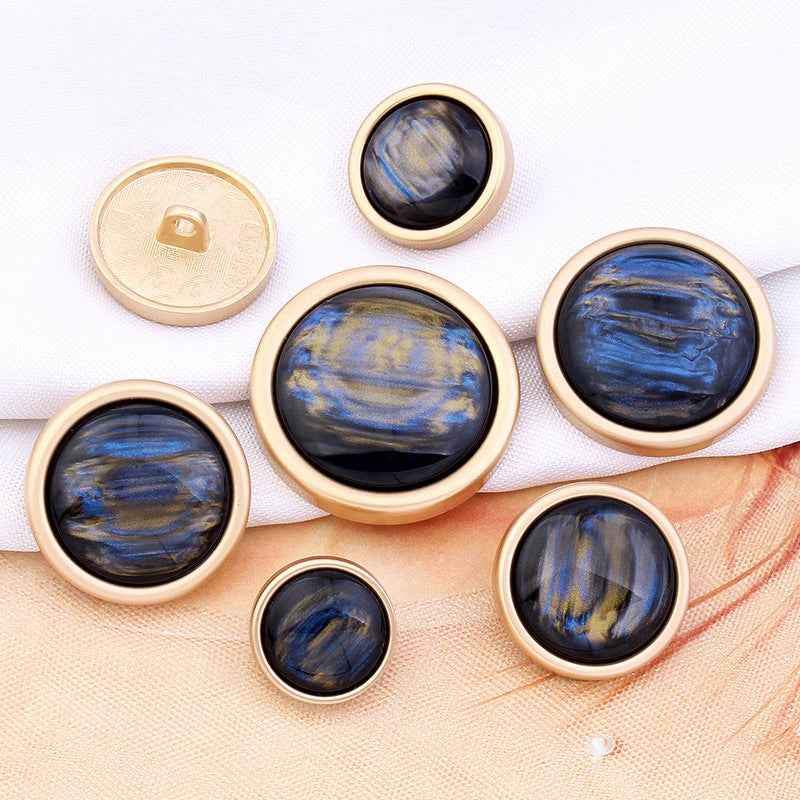 White cat’s eye gemstone shank button with gold rim, round face, 15–28mm