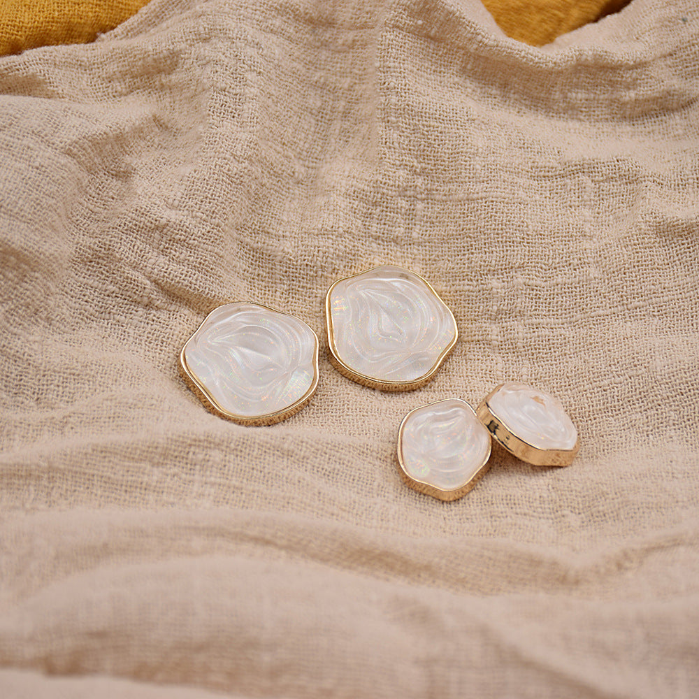 Transparent floral resin buttons, light blue with gold-tone metal edging