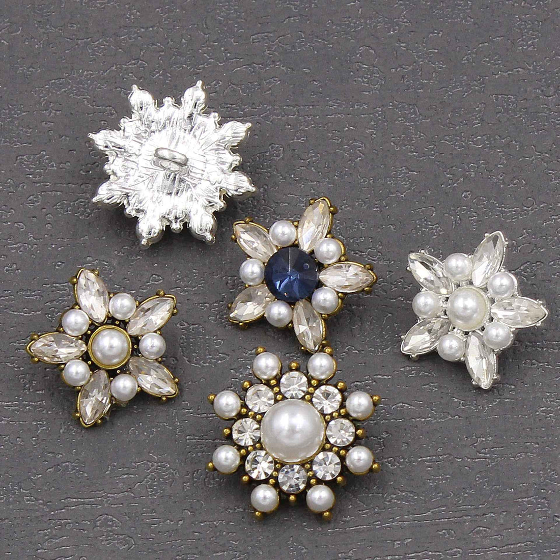 Star-shaped pearl crystal button set with mixed clear crystals, pearls, and gold-tone bases