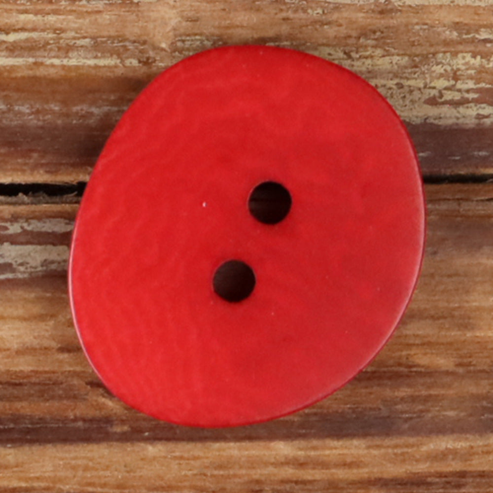 Red natural 2-hole button with two stitched holes, round irregular shape.