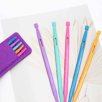 5-piece sewing tool set with purple, blue, pink, teal, and yellow needle tools