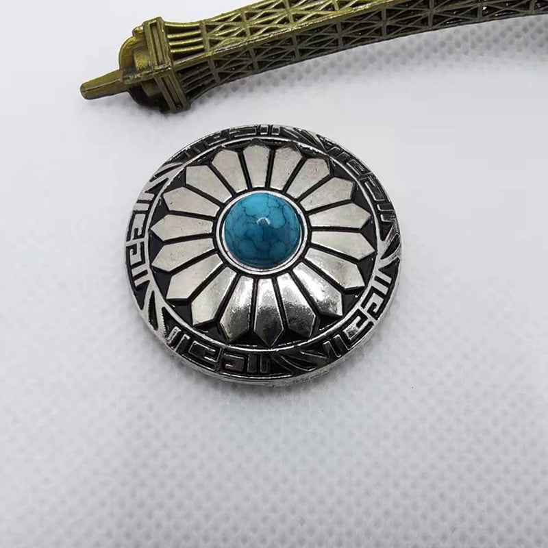 30mm round alloy button with turquoise cabochon and black-and-silver sunburst pattern