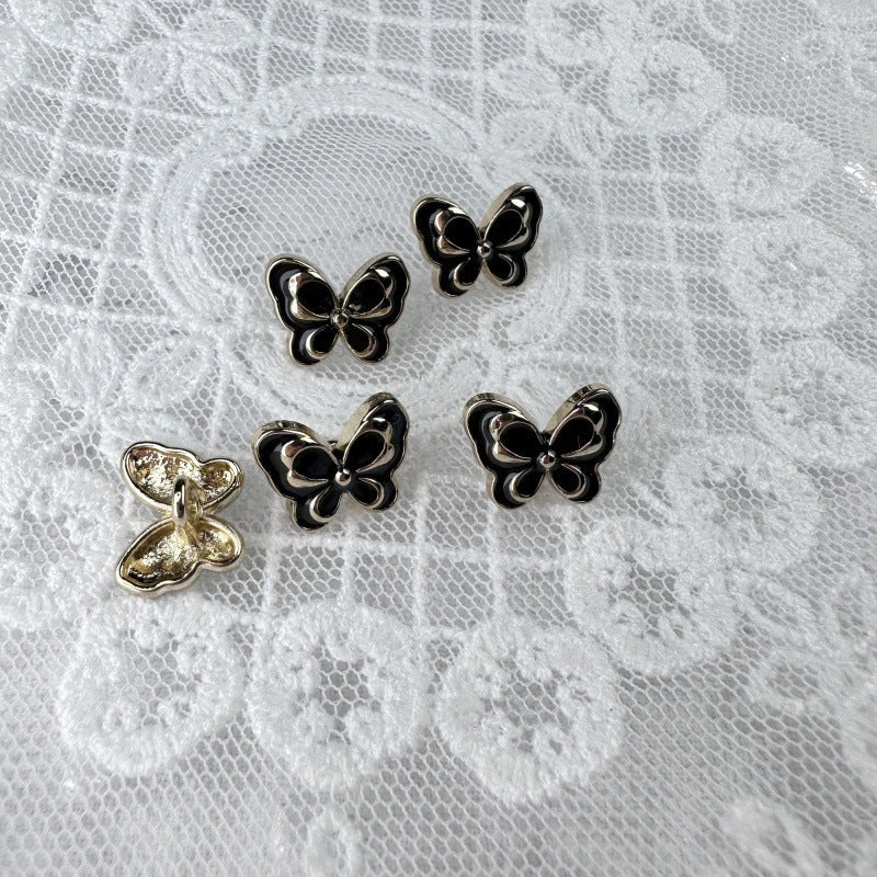 12mm butterfly metal buttons set: black and white enamel, gold-toned back loops