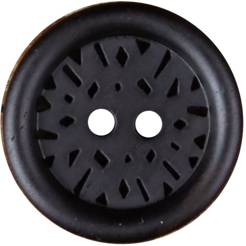 Round dark 2-hole coat button with laser-cut radial design and smooth rim