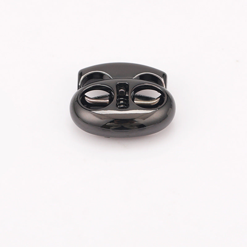 Oval pig nose two-hole metal cord lock, black finish, spring drawstring clasp