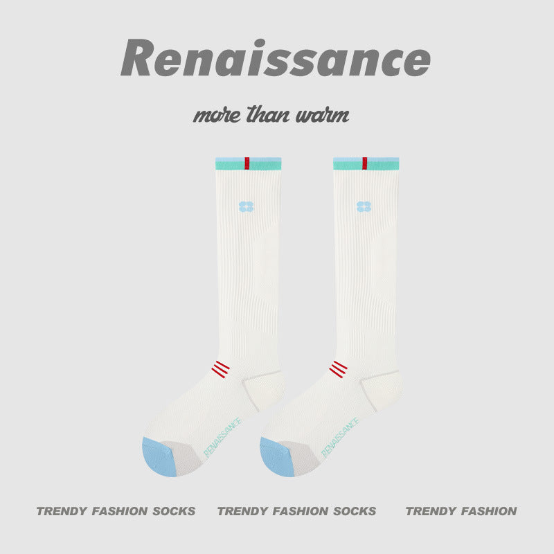 White compression running socks with light blue heel and mint cuff band