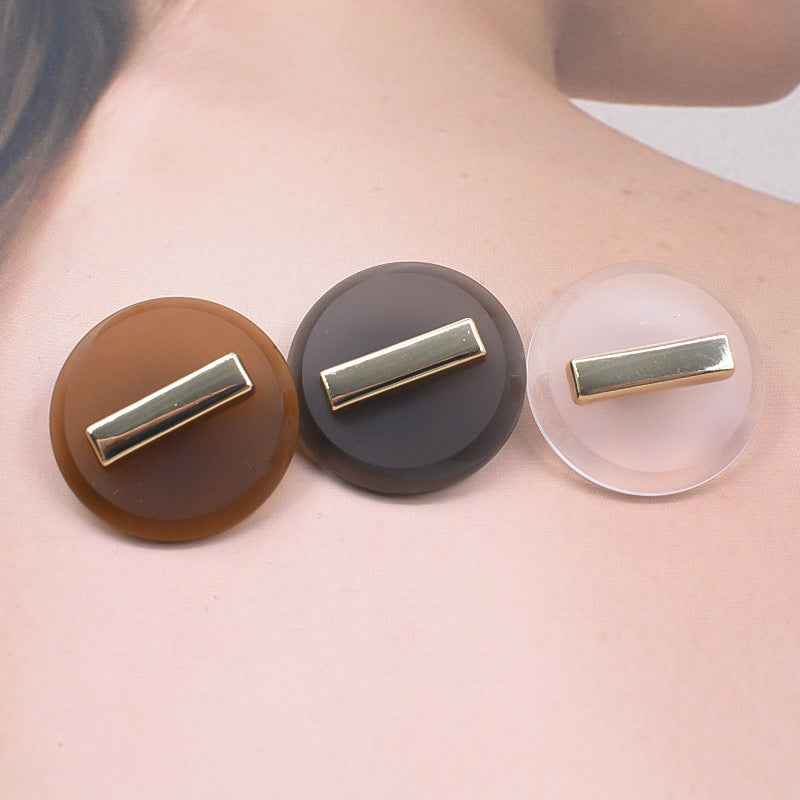 23/25mm metal shank buttons: transparent, black, and brown resin with gold bar
