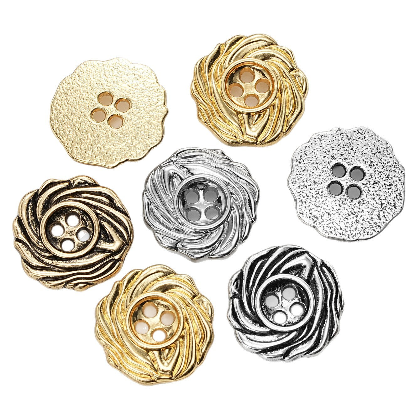 Metal spiral buttons set in gold and silver tones—round, 4-hole design, top view