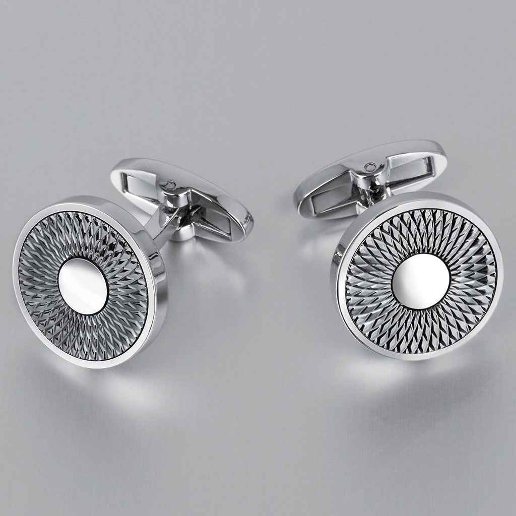 Set of silver-tone round cufflinks with textured faces and bar clasps
