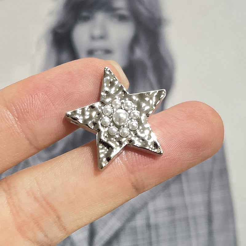 Gold wavy star metal shank button with pearl accents, single piece