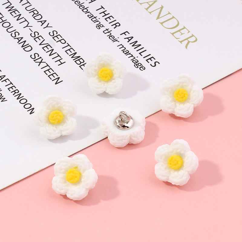 White daisy flower plastic buttons, 13mm; yellow centers, silver backs